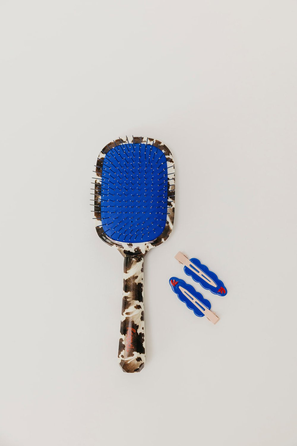 KAXI COW PRINT SCALP TO ENDS BRUSH - Poppy & Vine